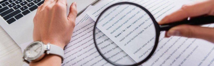 reading with a magnifying glass
